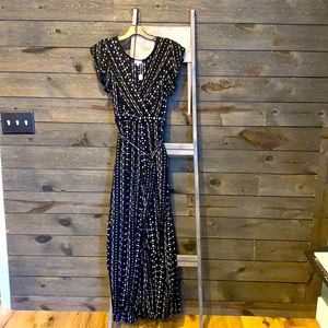 Belted jumpsuit. New with tags